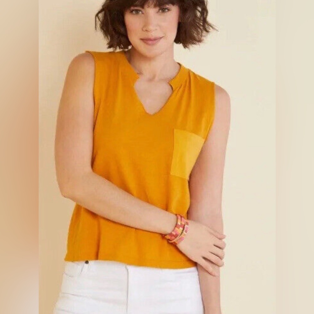 LNA orange muscle tank with pocket detail